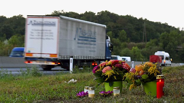 150829221548_flowers_candles_austria_migrants_death_624x351_epa_nocredit.jpg