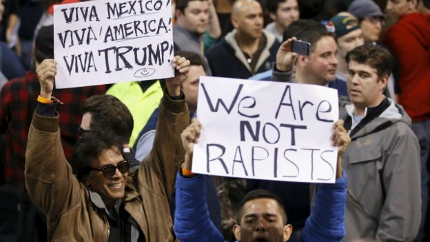 demonstrators_hold_signs