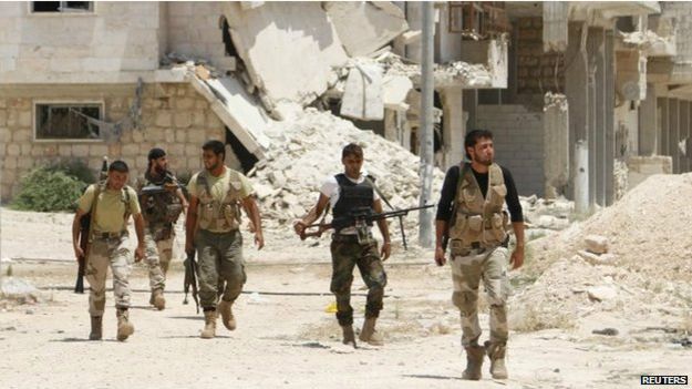 140925152153_free_syrian_army_fighters_walk_together_in_the_southern_part_of_maarat_al-nouman_idlib_province_july_2014_624x351_reuters_nocredit.jpg