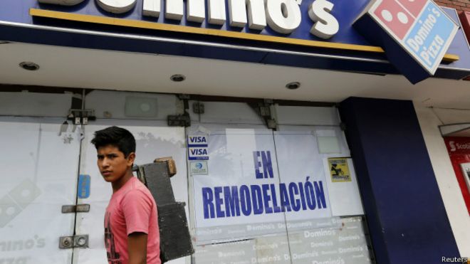 Fachada de loja da Domino's no Peru | Foto: Reuters