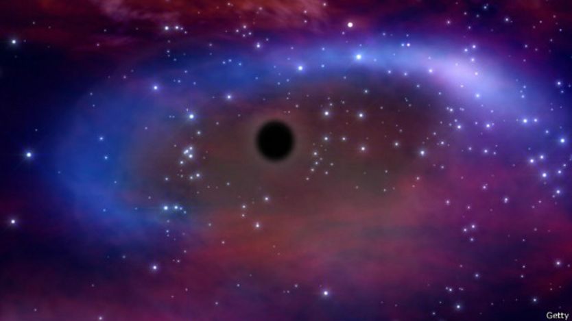 Ilustración de la NASA que muestra la fuerza gravitacional de un agujero negro