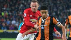 Curtis Davies (right)