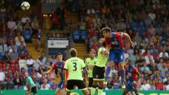 Scott Dann scores with a header