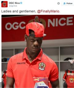 Balotelli poses with his MOTM award
