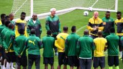 Hugo broos with Cameroon players