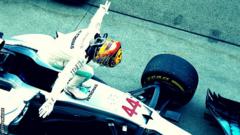Lewis Hamilton celebrates winning the Japanese GP.