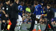 Yannick Bolasie goes off injured against Manchester United