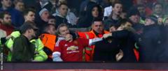 Stewards had to step in as trouble flared between fans at Old Trafford