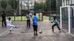 Boys playing football