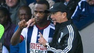 West Brom manager Tony Pulis (right) and striker Saido Berahino