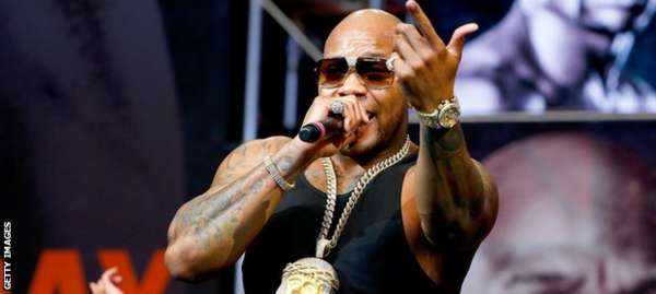 Rapper Flo Rida performs before the weigh-in