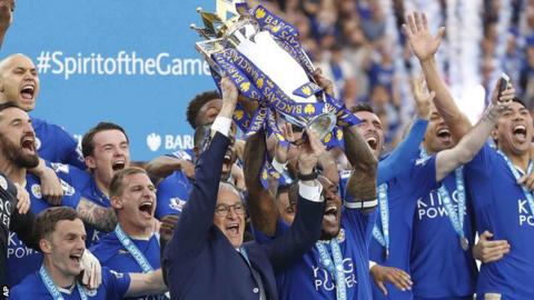 Leicester City lift the Premier League trophy in 2015-16