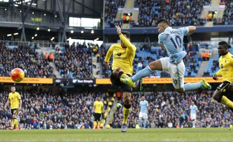 Sergio Aguero scores Manchester City's third goal against Aston Villa