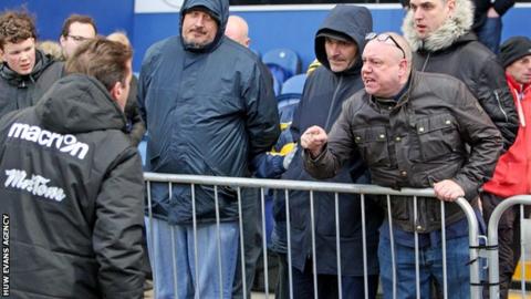 Graham Westley argues with fan