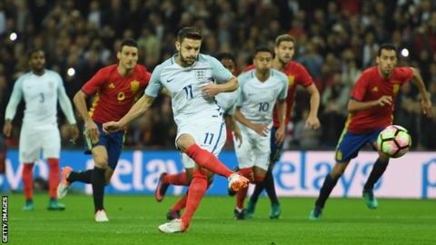 Adam Lallana scores a penalty to give England the lead against Spain