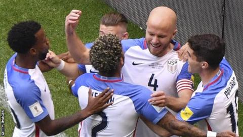 Michael Bradley (second from right) is congratulated by team-mates after his goal