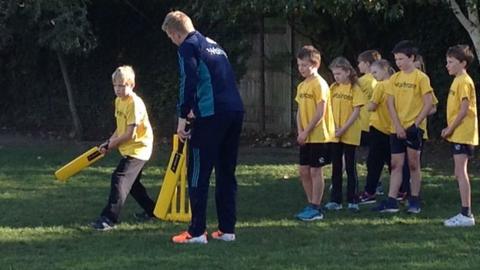 England Cricket's Sam Billings help children take part in cricket