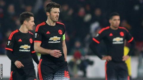 Michael Carrick (centre) and team-mates in Denmark