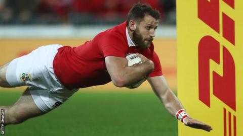 Tommy Seymour dives over for his first score against the Hurricanes
