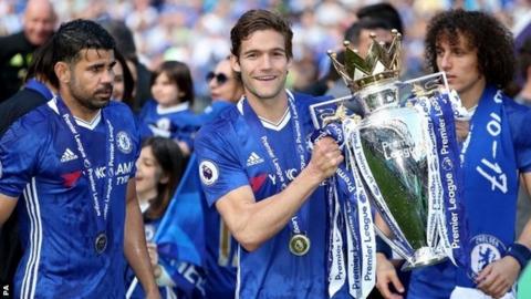 Chelsea players with the Premier League trophy