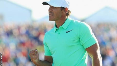 Brooks Koepka celebrates winning the US Open