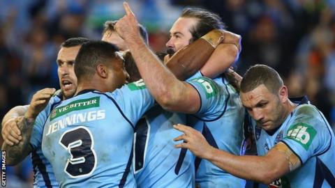 Aaron Woods celebrates his try, New South Wales' third