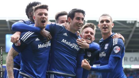 Cardiff players celebrate Peter Whittingham's injury time penalty