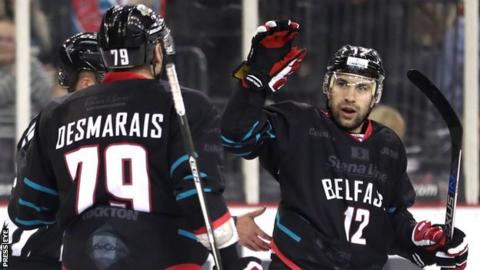 Steve Saviano celebrates with team-mates after one of his four goals on Saturday night