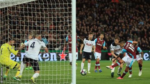 West Ham's Manuel Lanzini scores from close range against Tottenham last season.