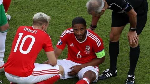 Wales captain Ashley Williams is injured against Northern Ireland