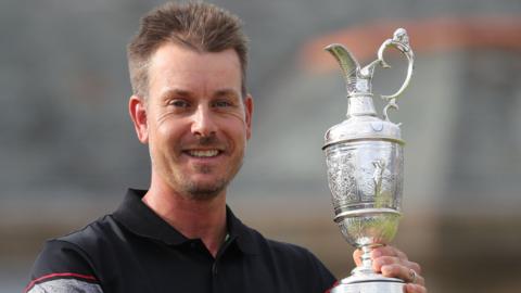 Henrik Stenson poses with the Claret Jug after his 2016 triumpuh