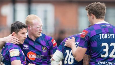 Wigan celebrate Morgan Escare's try