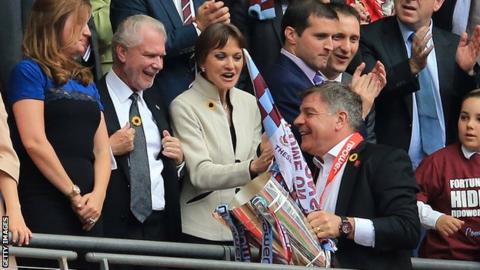 Sam Allardyce (front) and David Gold (second from left)
