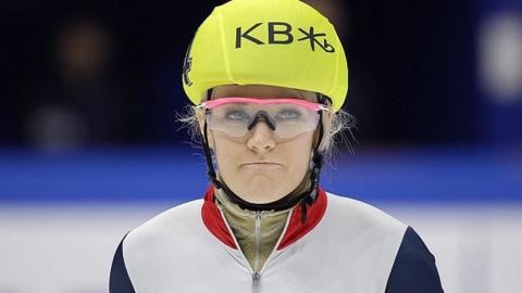 Elise Christie waits to competes in the 1000m at the Short-Track Speed Skating World Championships