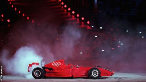 F1 car with the Olympic rings