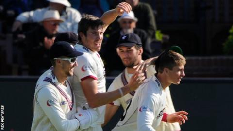 Jamie Overton (centre, focus)
