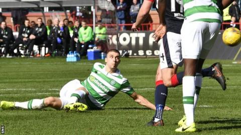 Jozo Simunovic steers the ball towards goal for Celtic's opener