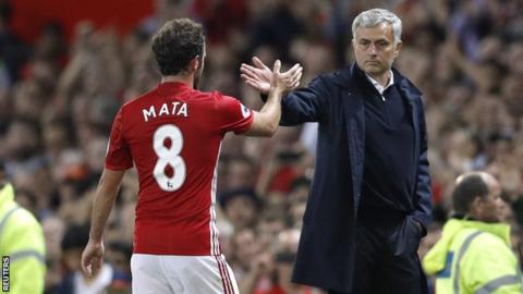 Manchester United manager Jose Mourinho and Juan Mata
