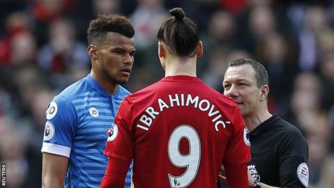 Bournemouth defender Tyrone Mings (left) and Manchester United striker Zlatan Ibrahimovic