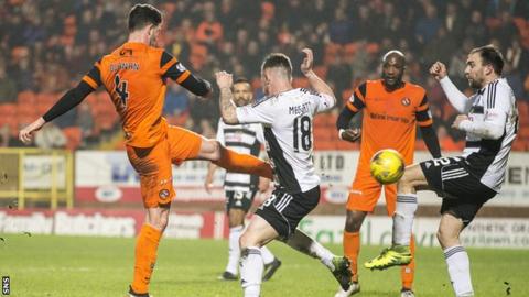 Mark Durnan scores