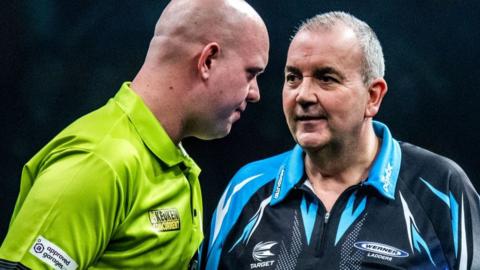 Michael van Gerwen and Phil Taylor