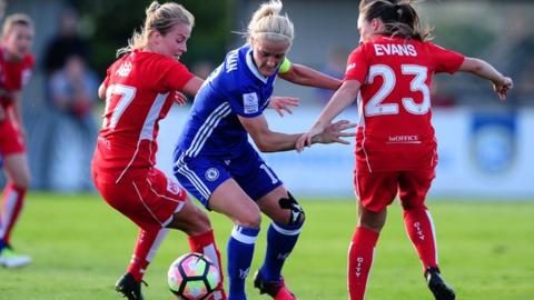 Georgia Evans and Lily Agg of Bristol City Women tackle Katie Chapman of Chelsea Ladies