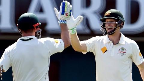 Adam Voges (right) celebrates his century with Shaun Marsh