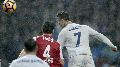 Cristiano Ronaldo scores against Sporting Gijon