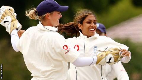 Isa Guya and wicketkeeper Jane Smit celebrate a wicket at Bowral in 2008
