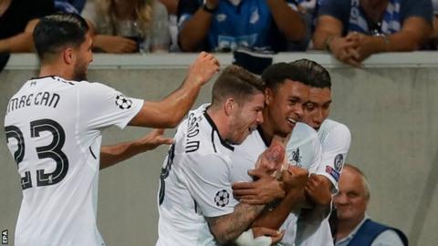 Trent Alexander-Arnold (second from right) celebrates with team-mates