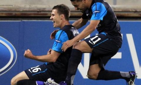 Aaron Ramsey (left) celebrates scoring the winner