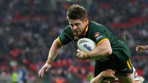 Australia's Chris Lawrence scores a try
