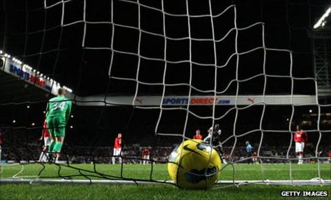 Ball nestles in the Manchester United net after Demba Ba's goal