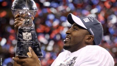 New York Giants wide receiver Hakeem Nicks with the Super Bowl trophy
